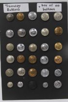 A large collection of tramways buttons, 35 on a carded display and the majority in annotated sleeves