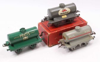 Three Hornby 0-gauge tank wagons: 1927-30 Pratts, Angloco, green open axle guard base, green