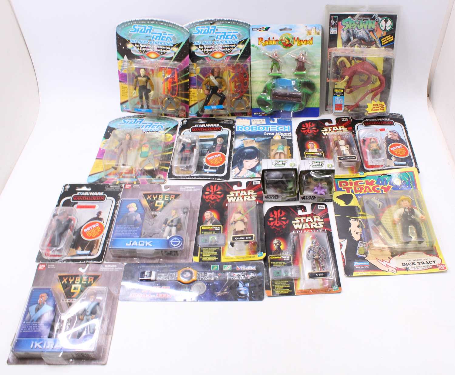 A tray of carded figures including Robotech 1980, Star Trek Next Gen 1992(3) Xyber9 1999 (2),