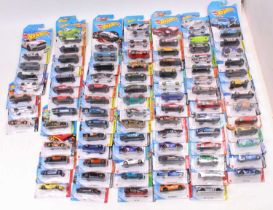 One box containing a large quantity of mixed Hotwheels modern released carded diecast vehicles,