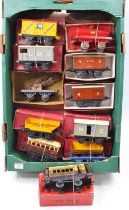 A large tray containing ten mostly pre-war Hornby goods wagons, overall (G) (BF-G) with one each