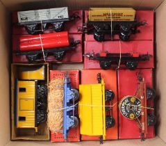 Eight items of Hornby 0-gauge goods wagons. All (NM-M): Pre-war Snowplough yellow with blue edging &