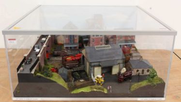 A 00 gauge industrial scene plastic and cased diorama to measure 630mm wide x 610mm deep x 290mm