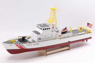Pre-built radio-controlled model of a US Coast Guard cutter, fitted with a twin can motors and the