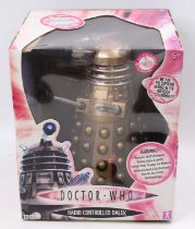 A Doctor Who radio controlled Dalek with special features, housed in the original card and window