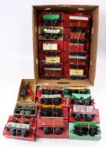 A very large tray containing 21 Hornby boxed goods wagons and a No.20 loco. Most wagons are post-war