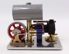 A scratch built from brass, copper and gunmetal components, stationary horizontal hot air engine,