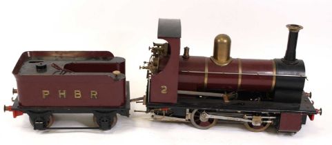 A well-engineered 5" gauge coal-fired "Polly 2" locomotive and tender, 0-4-0 alignment and hand