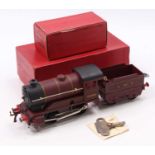 1949-54 Hornby 0-gauge No.501 0-4-0 clockwork loco & tender LMS maroon No.5600 with key. Sans
