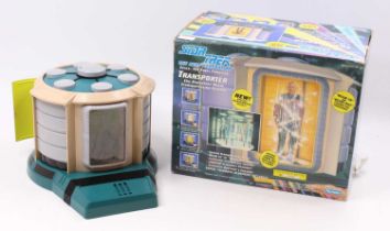 A Star Trek The Next Generation Interactive Play Transporter No.6104 by Playmates, with various