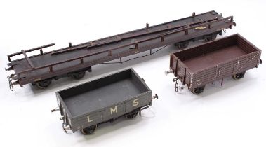 Three Gauge 1 wooden goods wagons, LMS bogie transporter, in need of repair one side; 5-plank open