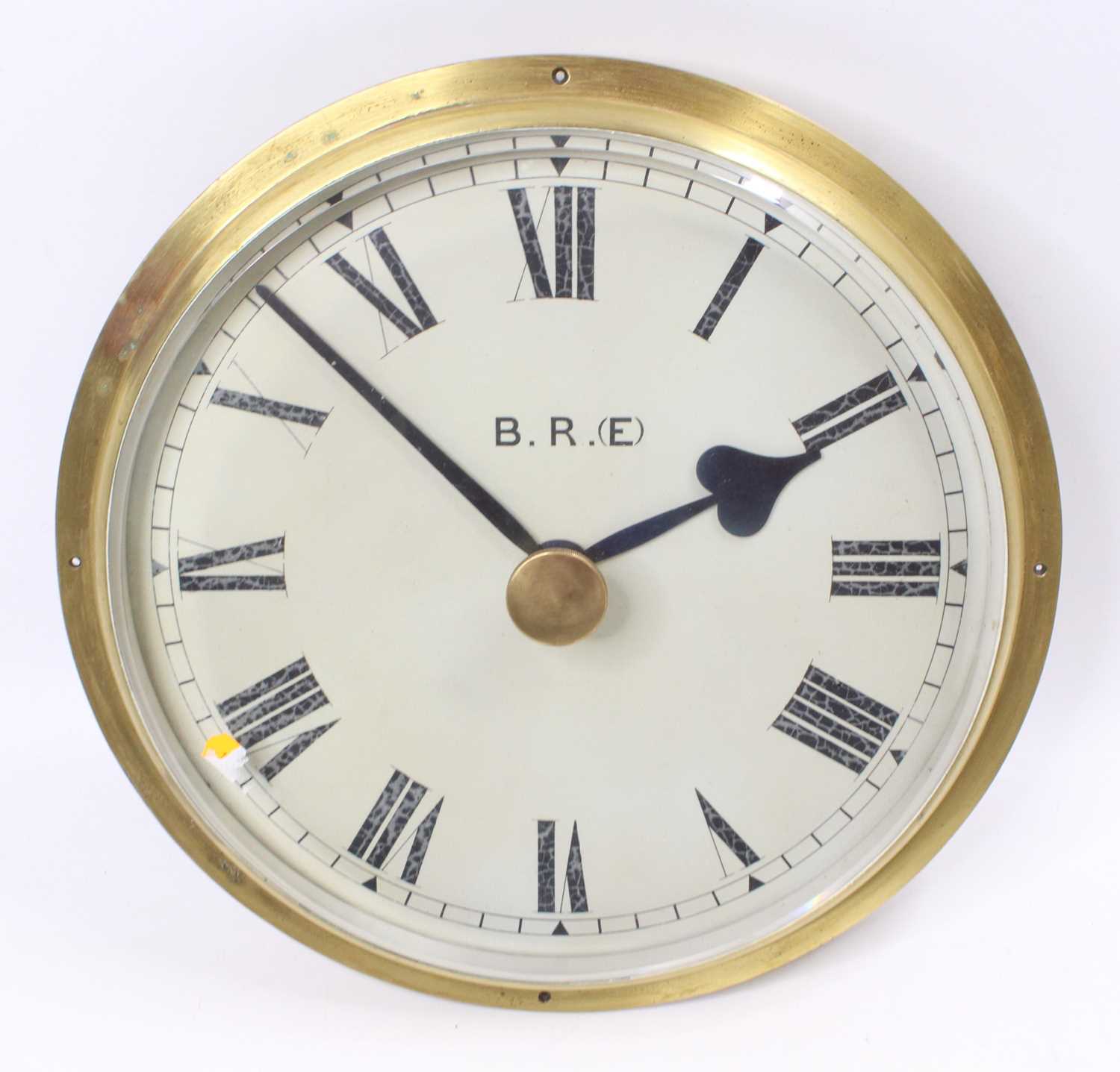 BR (E) stamped clock dial, comprising white dial with Roman numerals, un-powered example, appears to