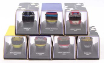 Seven Minichamps 1/8 scale helmet collection by Pauls Model Art to include Johnny Herbert 1996,