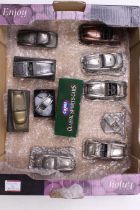 A collection of Austin Healey related pewter and resin display models by David Aldridge and
