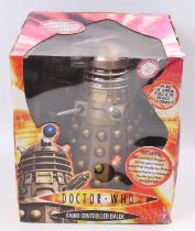 A Doctor Who radio controlled Dalek with special features, housed in the original card and window