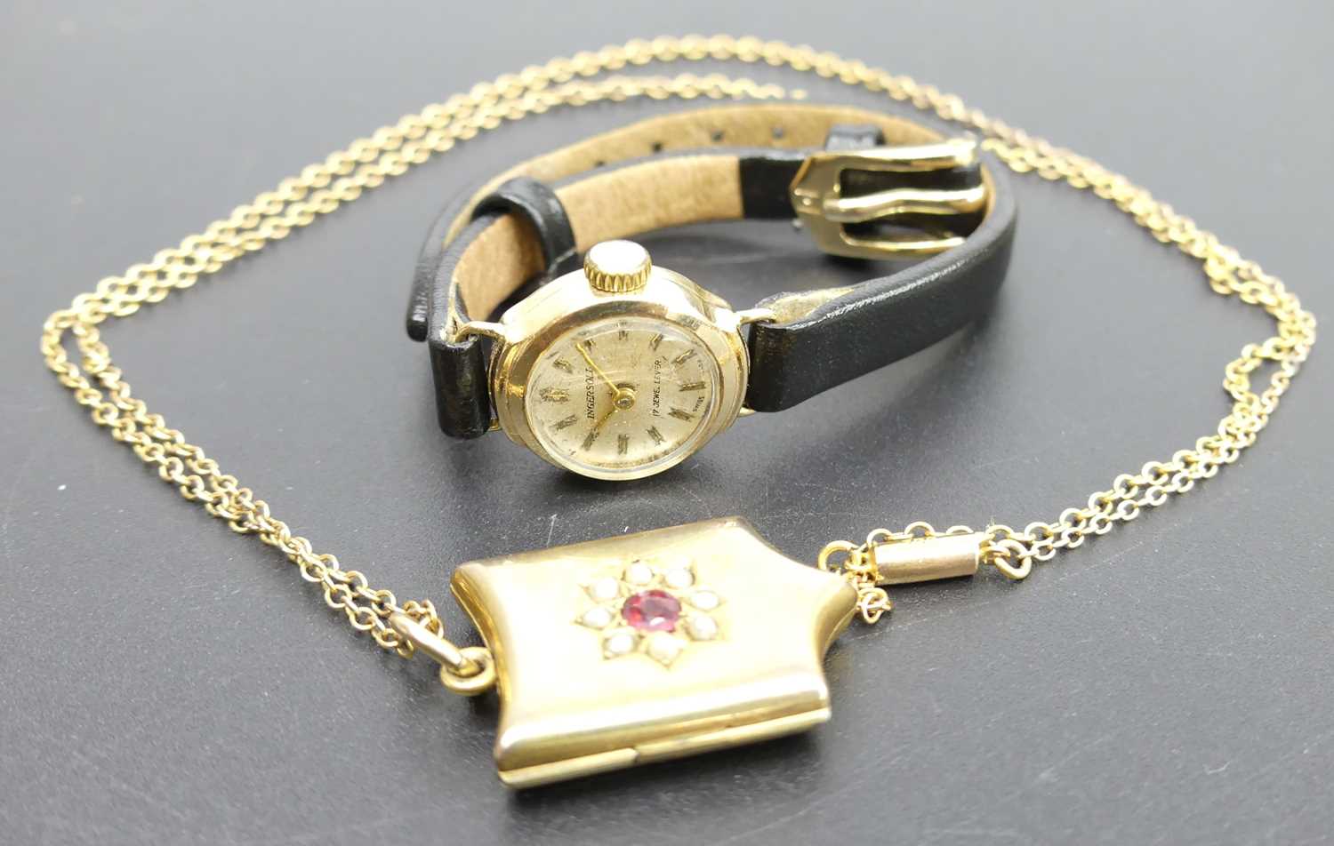 A 9ct gold finelink neck chain, with gilt metal and paste set pendant; together with a lady's 9ct