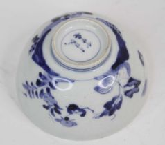 A Chinese blue and white porcelain bowl, decorated with flowers, six character mark to the base,