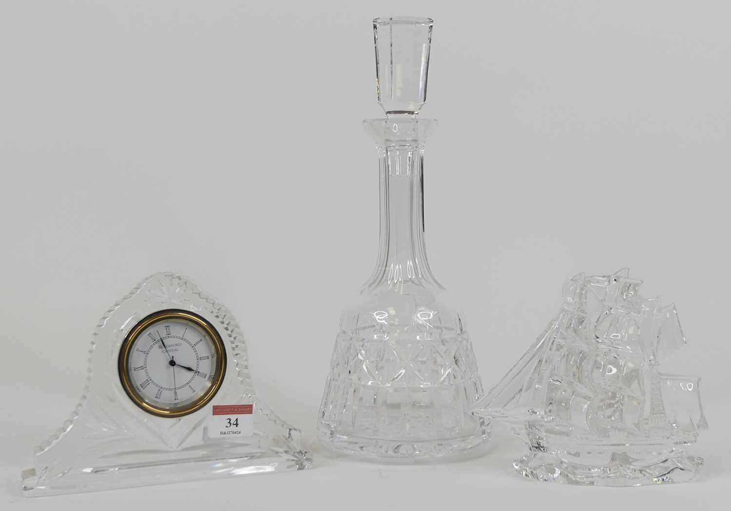 A Waterford crystal decanter, of mallet form, height 32cm, together with a Waterford crystal