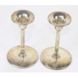 A pair of Elizabeth II weighted silver candlesticks, of plain circular form, maker LJ Millington,