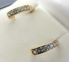 A pair of modern 9ct gold and green topaz set earrings, on post fittings, 2.3g, 1.5cm