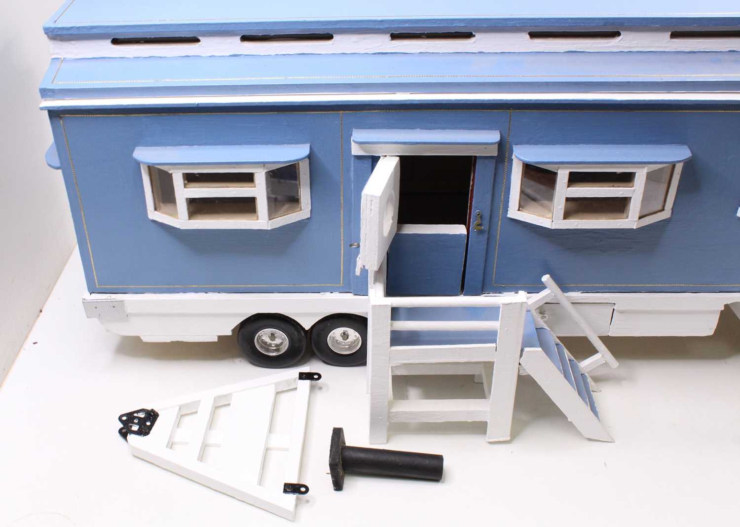 A well made wooden model of a travelling living quarters, finished in blue and cream with hinged - Image 2 of 6