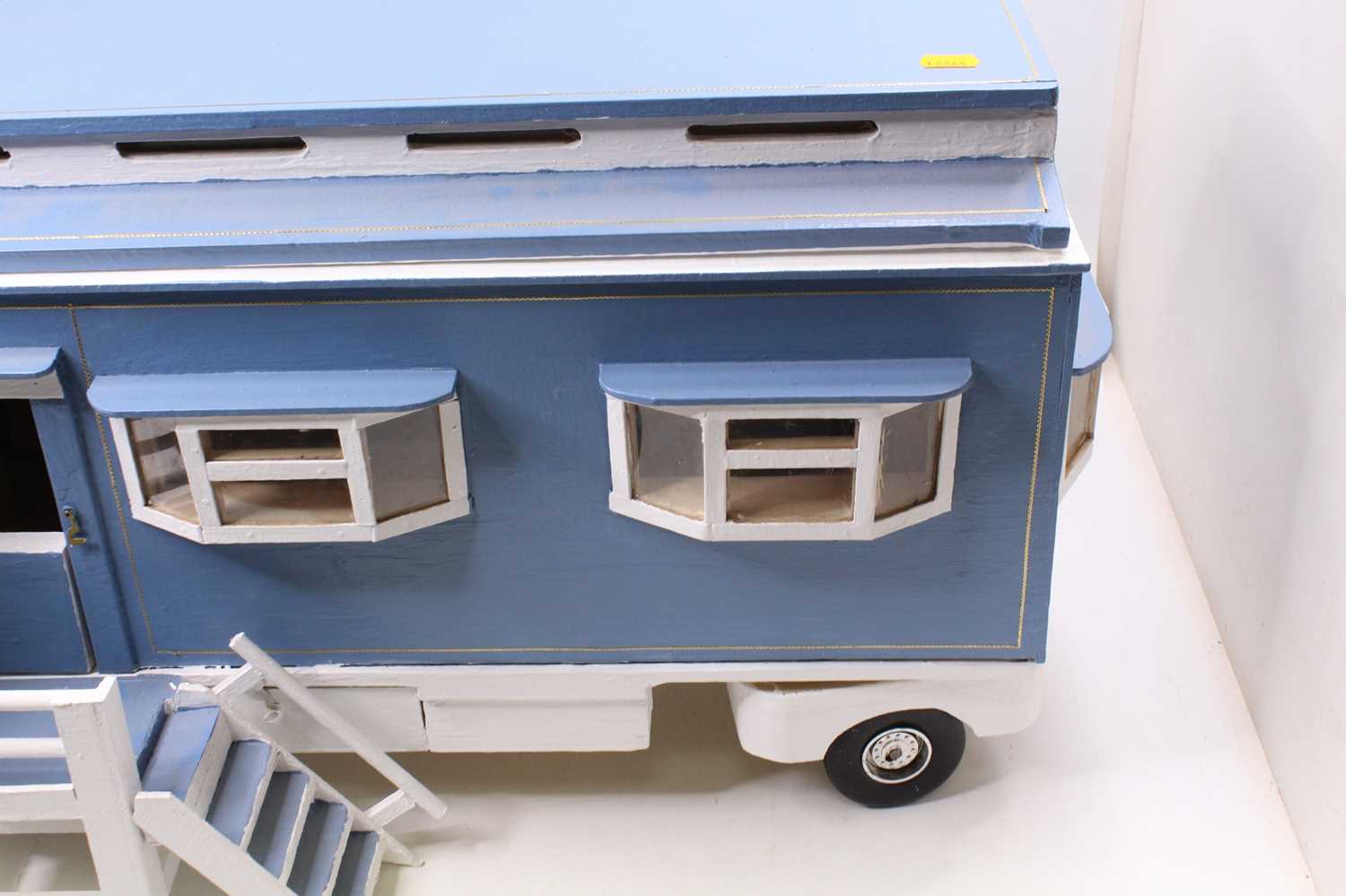 A well made wooden model of a travelling living quarters, finished in blue and cream with hinged - Image 5 of 6