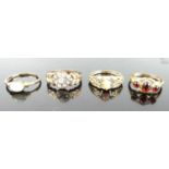 Four various 9ct gold dress rings, comprising coral, opal, garnet three-stone and white hardstone