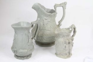 A collection of six Victorian relief moulded pottery jugs, largest height 27cm; together with