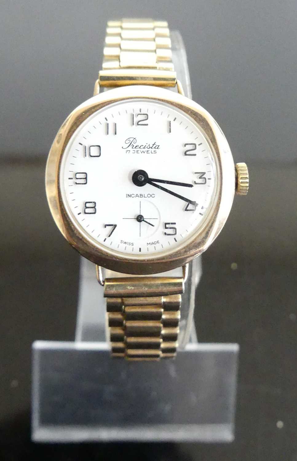 A Precista lady's 9ct gold cased vintage manual wind wristwatch, on gilt metal bracelet, case dia.