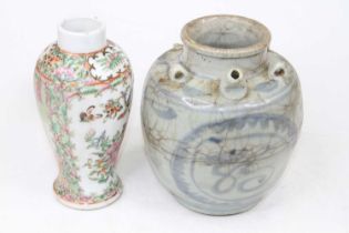 A Chinese Canton porcelain vase, of baluster form, enamel decorated with birds, h.19cm; together