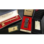 A gent's cased cigar cutter, Sarome pocket lighter in fitted case, one other by Maruman, and a cased