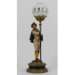 A 19th century painted spelter figural novelty night clock, in the form of a young courtier