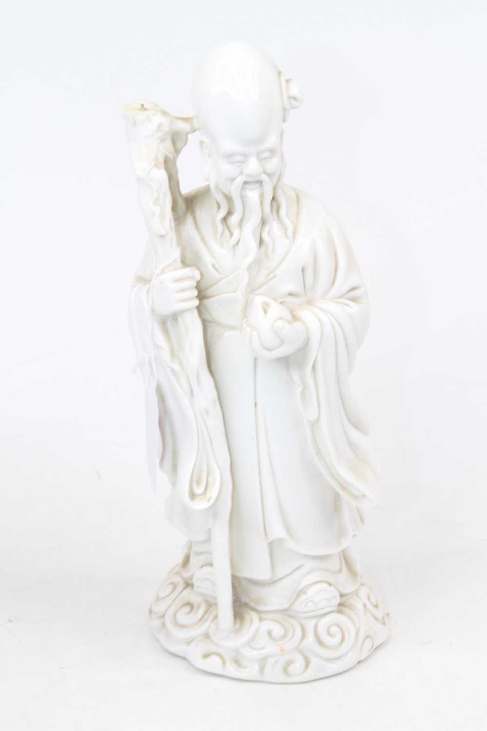 A Chinese blanc-de-chine figure of The Immortal Shou Lao, h.28cm