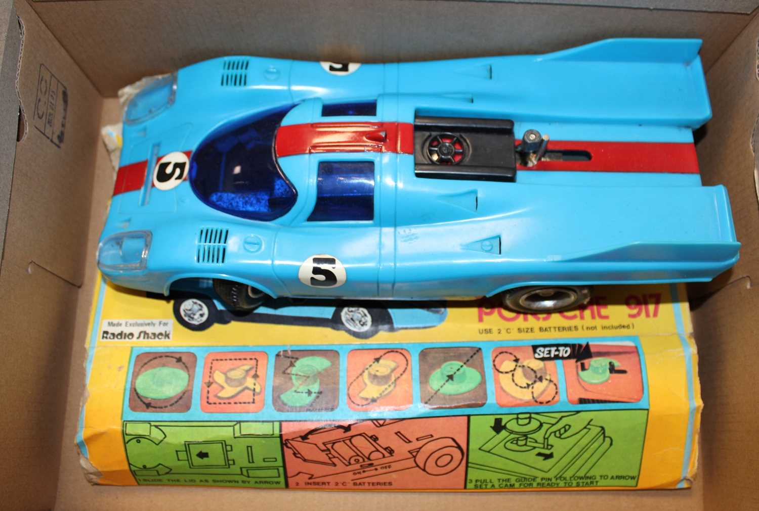 A Porsche 917 battery powered computer car by Radioshack