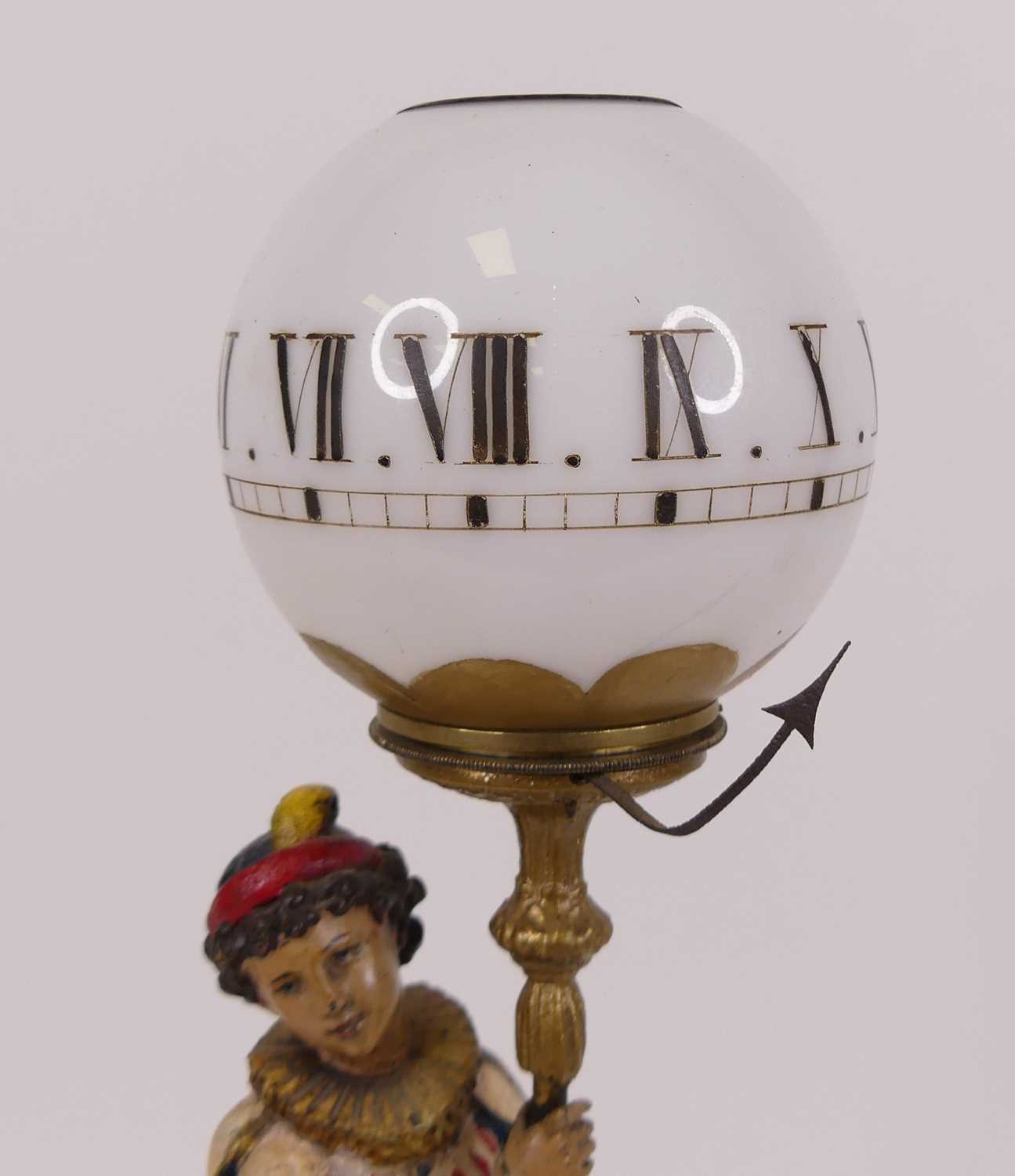 A 19th century painted spelter figural novelty night clock, in the form of a young courtier - Image 2 of 3