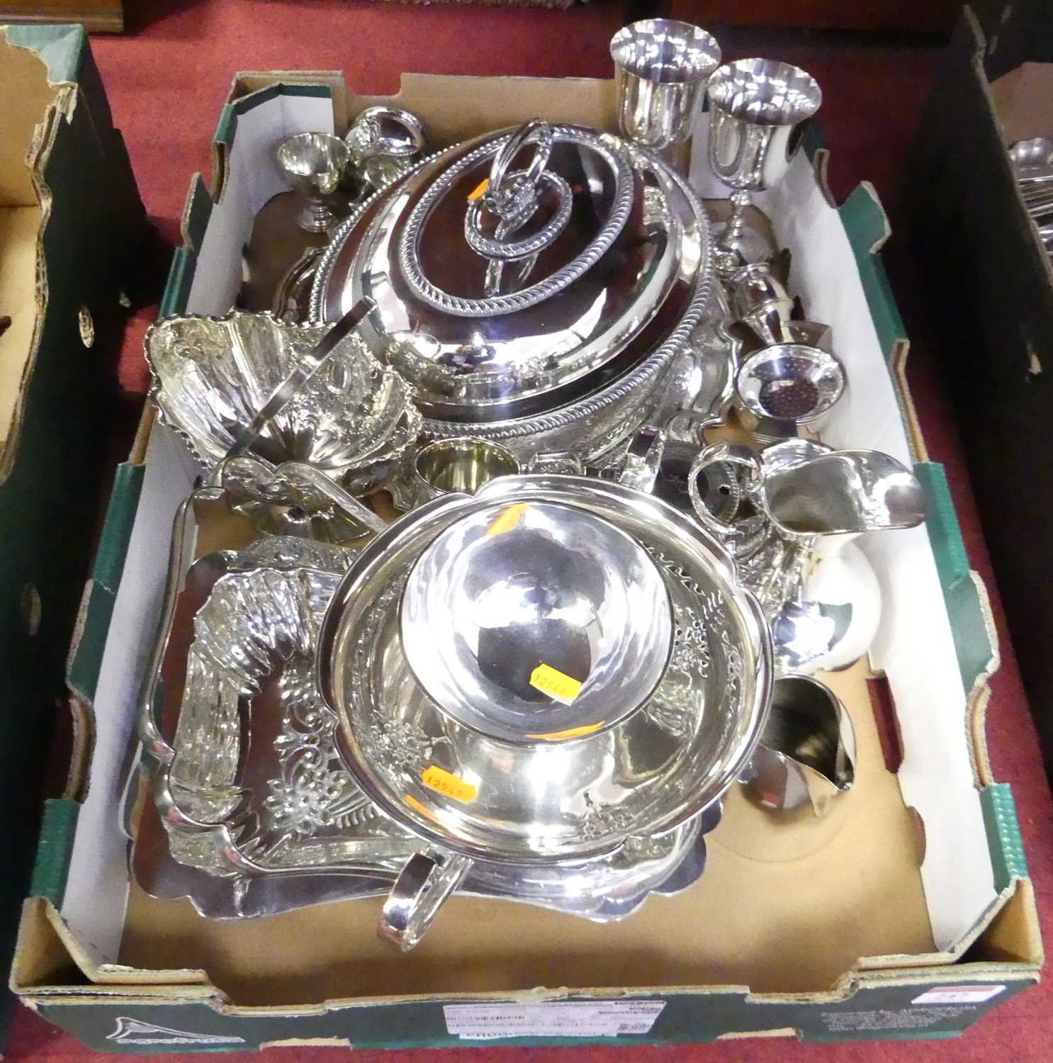 A collection of silver plated items to include entree dish, mustard, table basket, etc