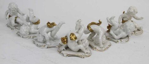 A collection of seven Italian figures of children playing, h.9cm
