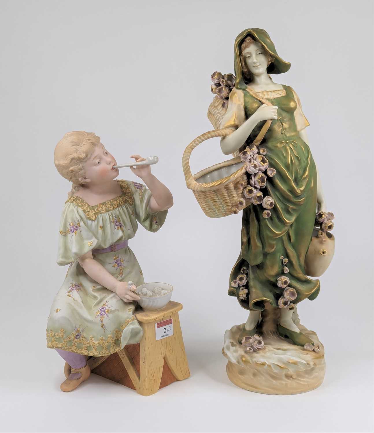 An Austrian porcelain figure of a lady, height 45cm, together with a Victorian bisque porcelain