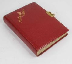 A vintage autograph letters album, mainly late 19th century, bound in red leather with lock