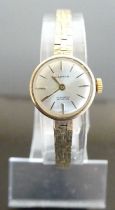 A lady's Mappin 9ct gold cased manual wind wristwatch, on integral 9ct gold bark-link bracelet, 14.