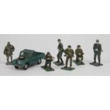 A vintage Corgi model diecast Landrover together with a collection of lead painted army figures