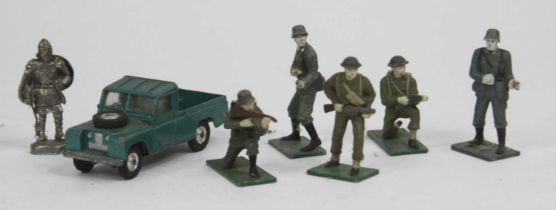 A vintage Corgi model diecast Landrover together with a collection of lead painted army figures