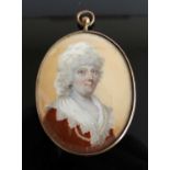 19th century English school - Bust portrait of a middle-aged woman, miniature on ivory, 6.5 x 5.3cm,