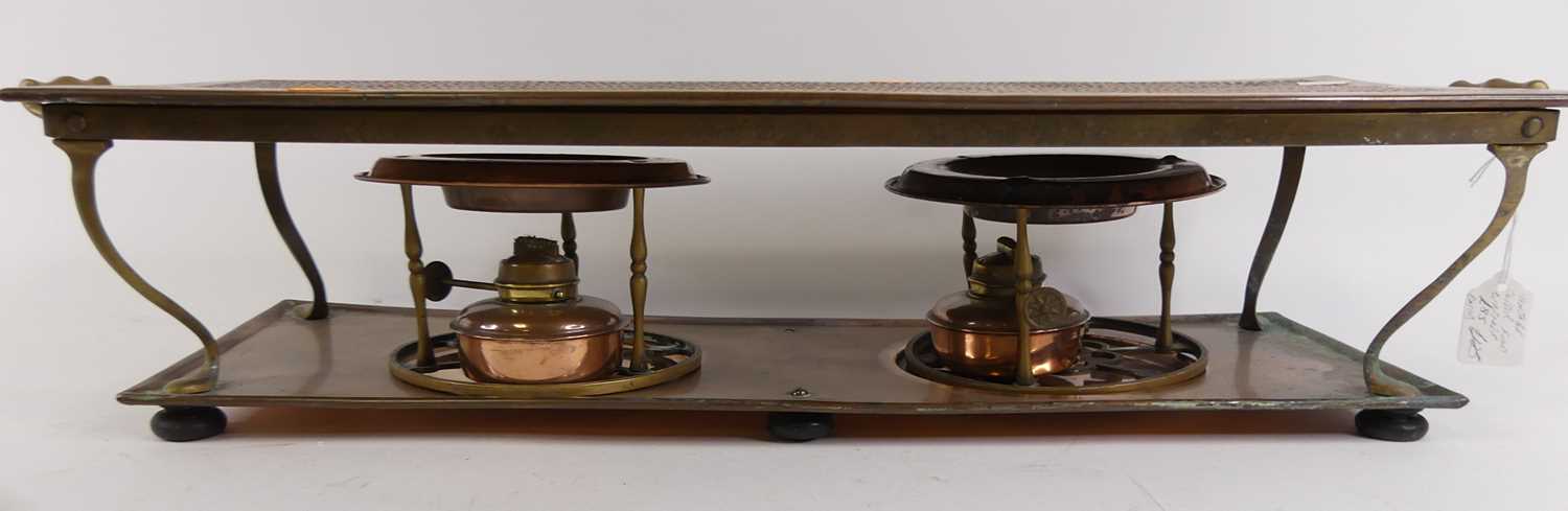 An early 20th century copper warming plate, the rectangular top with hammered finish, having twin - Image 3 of 3