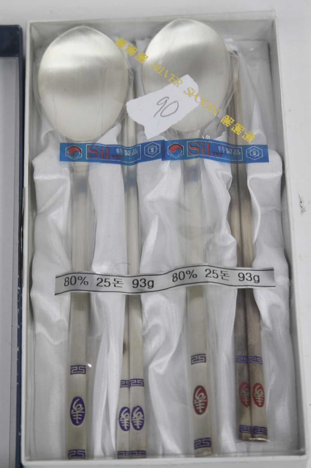 A Chinese white metal spoon and chopstick set, stamped 800, boxed - Image 2 of 2