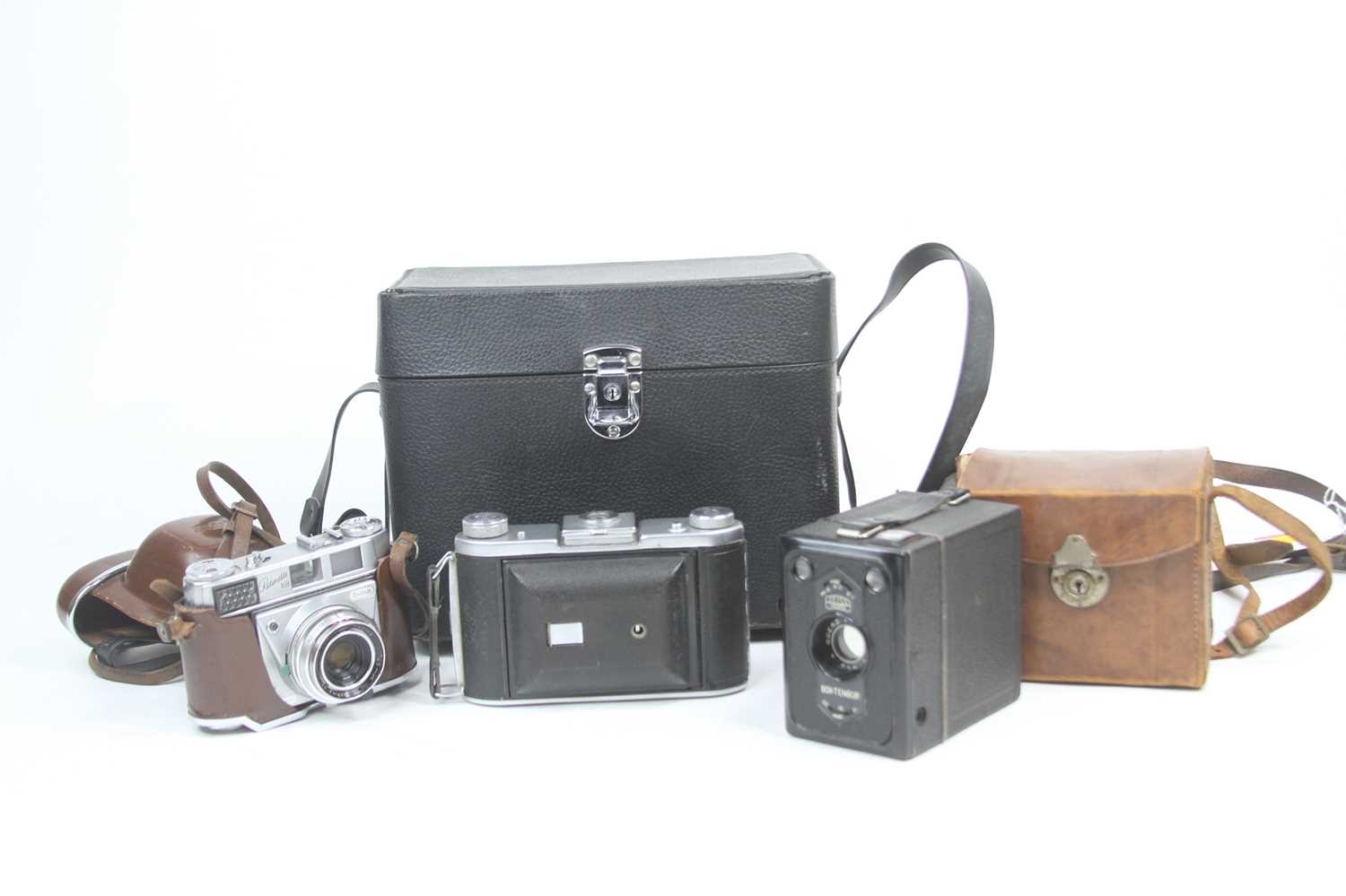 A collection of vintage photography equipment to include a Kodak Retinette SLR camera