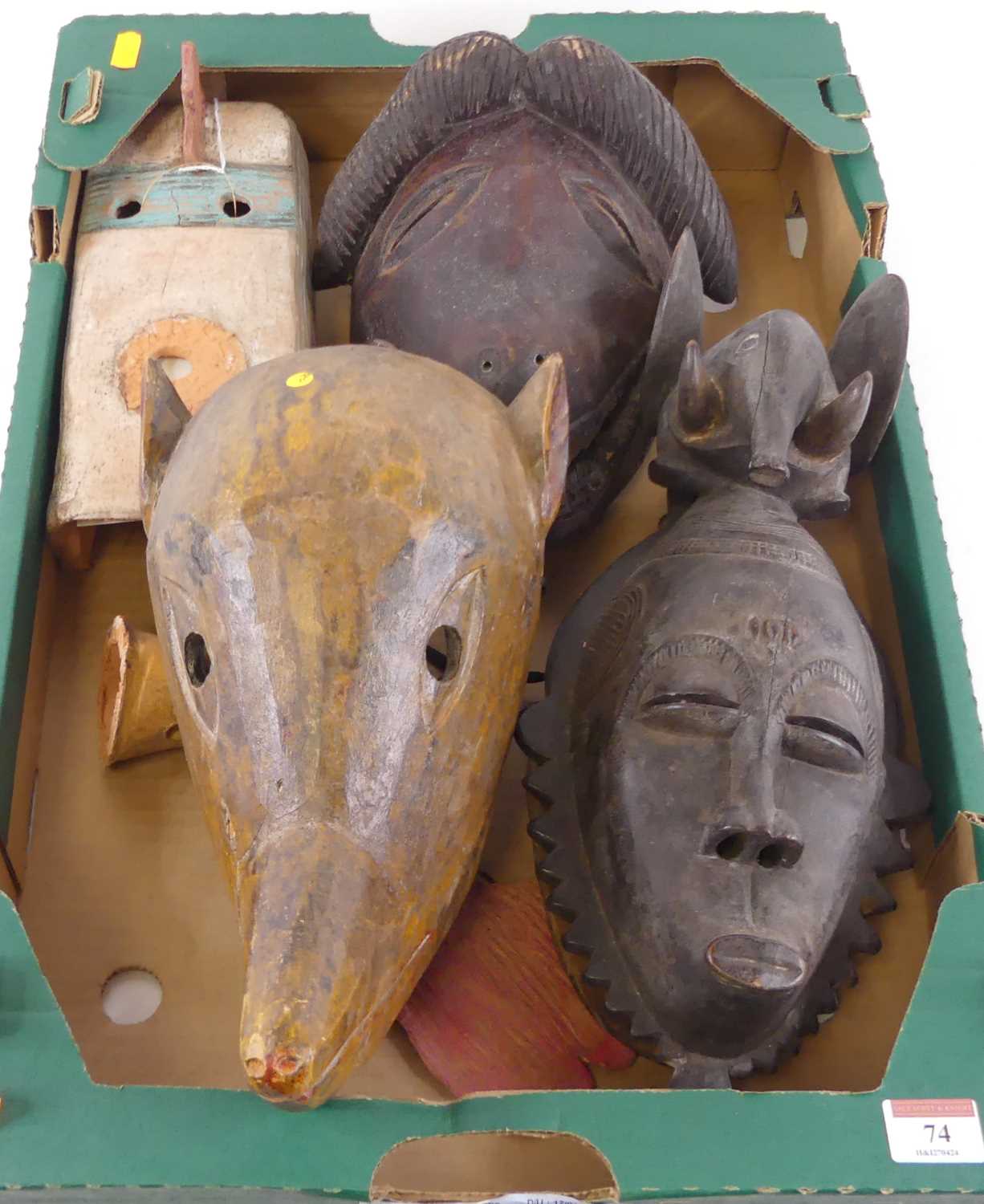 A carved wooden dance/initiation mask, probably Democratic Republic of Congo, together with two