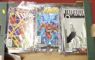 A collection of assorted comic books to include DC Flash, Malibu Comics, Battle Zones, etc