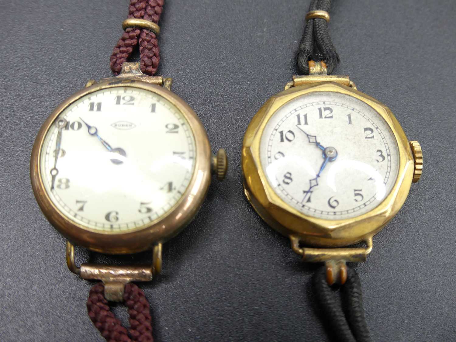 A vintage gold plated lady's manual wind wristwatch, case dia.25mm; together with one other (2)