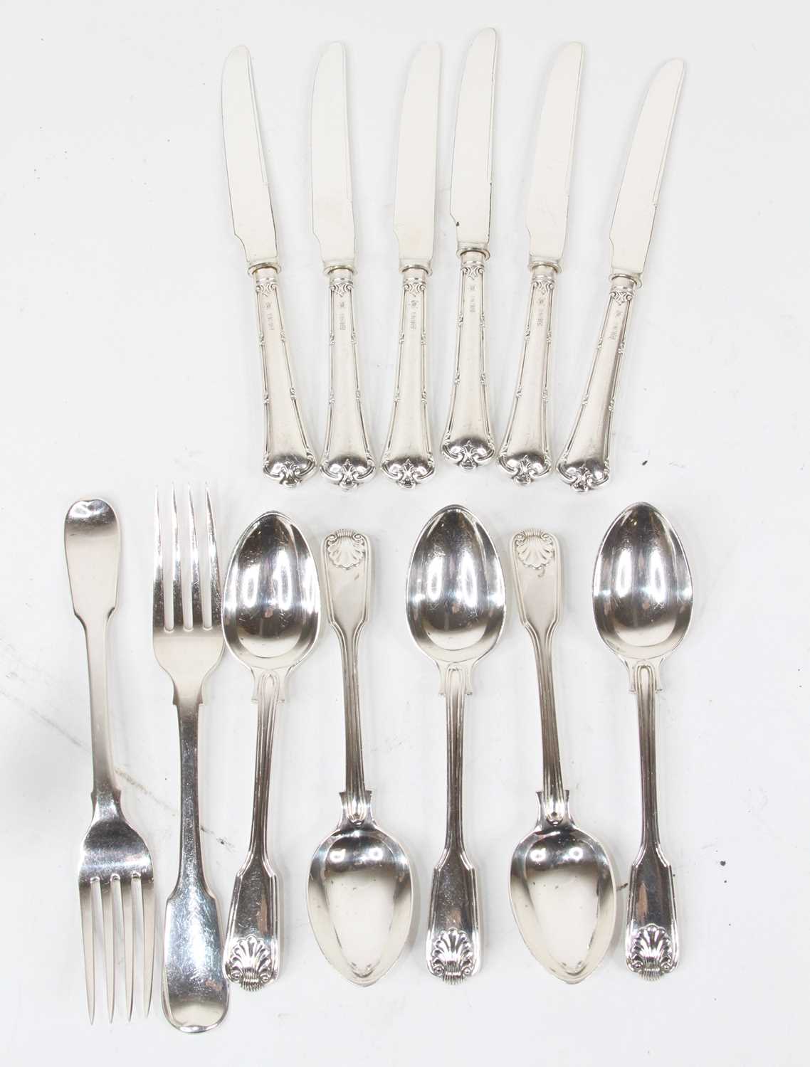 A set of five Victorian silver teaspoons, in the Fiddle & Shell pattern, maker John Aldwinckle &
